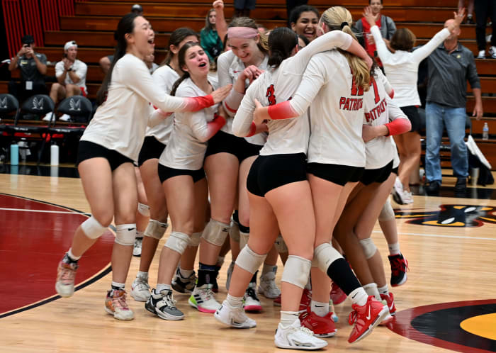 Carrollwood players celebrate winning the Class 3A state championship match on Thursday at the FHSAA girls volleyball state finals at Polk State College in Winter Haven.